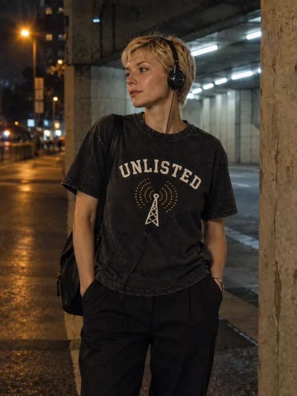 Unlisted Station Tee in Faded Black — worn at night